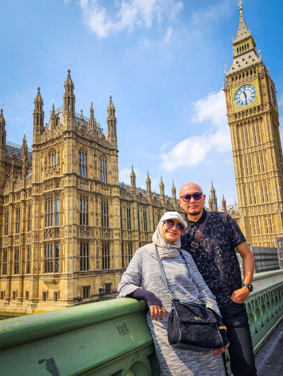 London, United Kingdom - man and woman in front of Big Ben (Westminster) in London